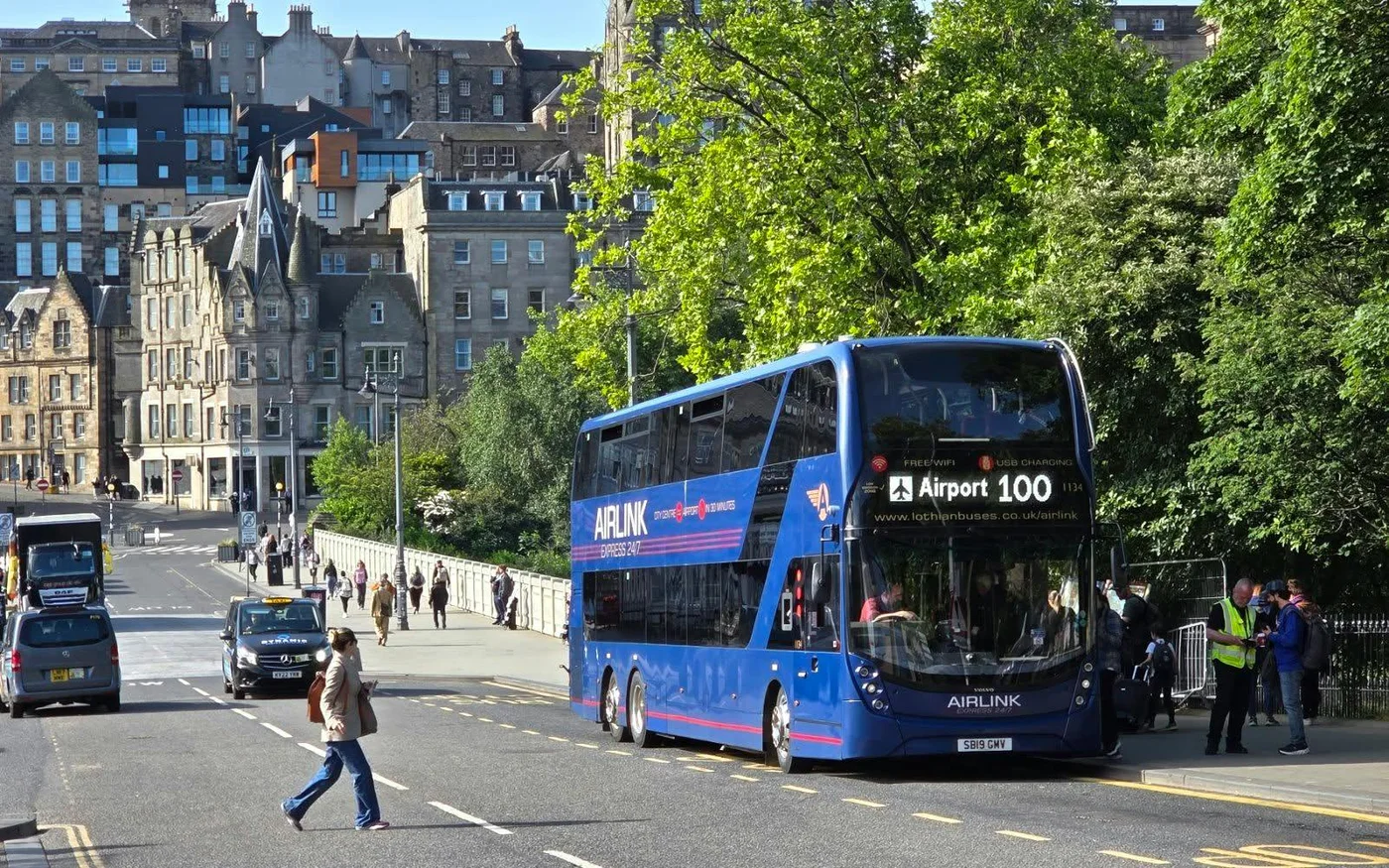 Blue Airlink 100 bus on an Edinburgh street