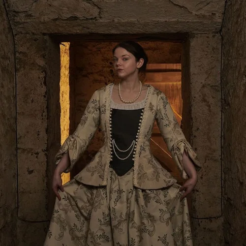 Costumed storyteller in a historic room at The Real Mary King’s Close